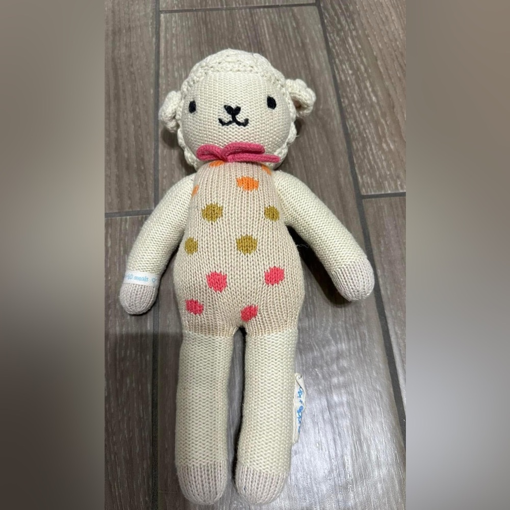 Cuddle + kind Lucy the lamb.